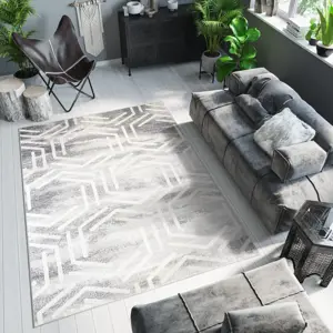Produkt Světlý designový koberec s geometrickým vzorem