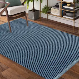 Produkt Modrý protiskluzový koberec vhodný do předsíně
