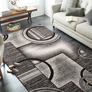Produkt Originální šedohnědý koberec s motivem abstraktních kruhů